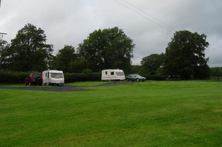 Two caravans in a field