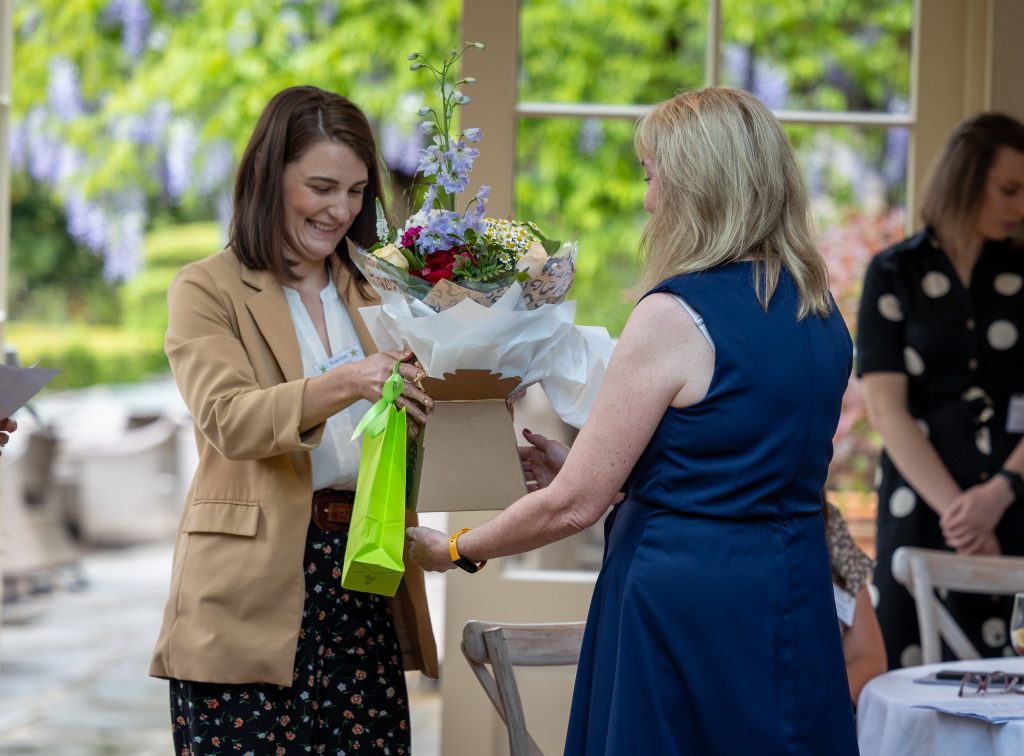 Bouquet being presented to Chair of RVTA 