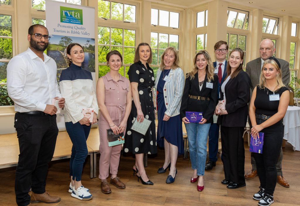Group photo of organizers inside hotel 